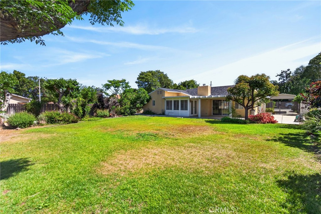 3560 McKinley Street Riverside, CA 92506 - Photo 30 of 45 a view of a house with backyard and a garden