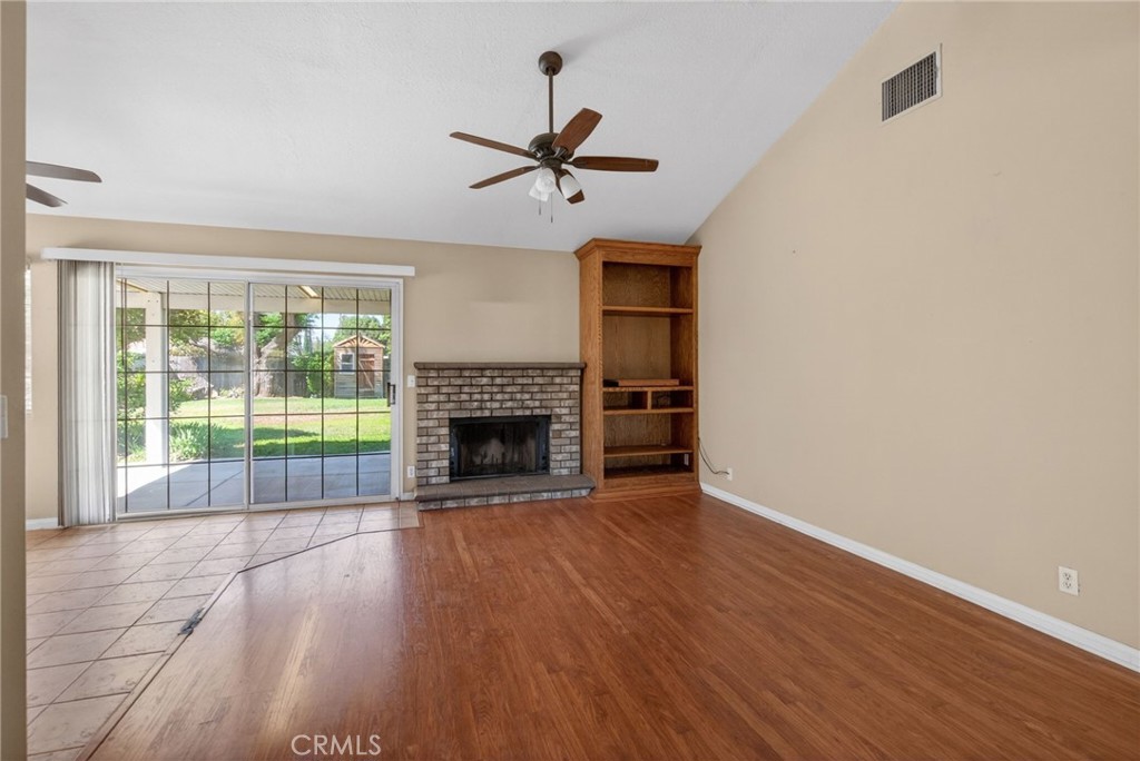 3560 McKinley Street Riverside, CA 92506 - Photo 4 of 45 an empty room with floor fireplace and windows