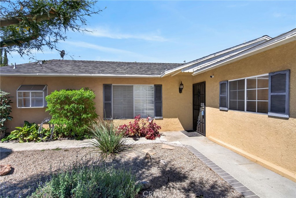 3560 McKinley Street Riverside, CA 92506 - Photo 42 of 45 a front view of a house with a yard