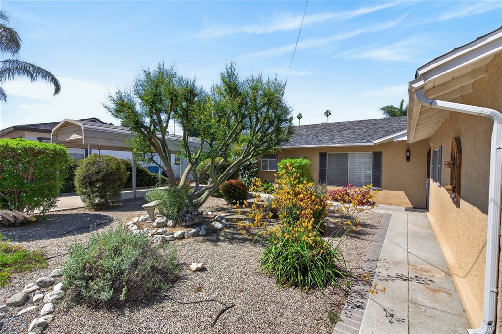 3560 McKinley Street Riverside, CA 92506 - Photo 43 of 45 a front view of a house with a yard
