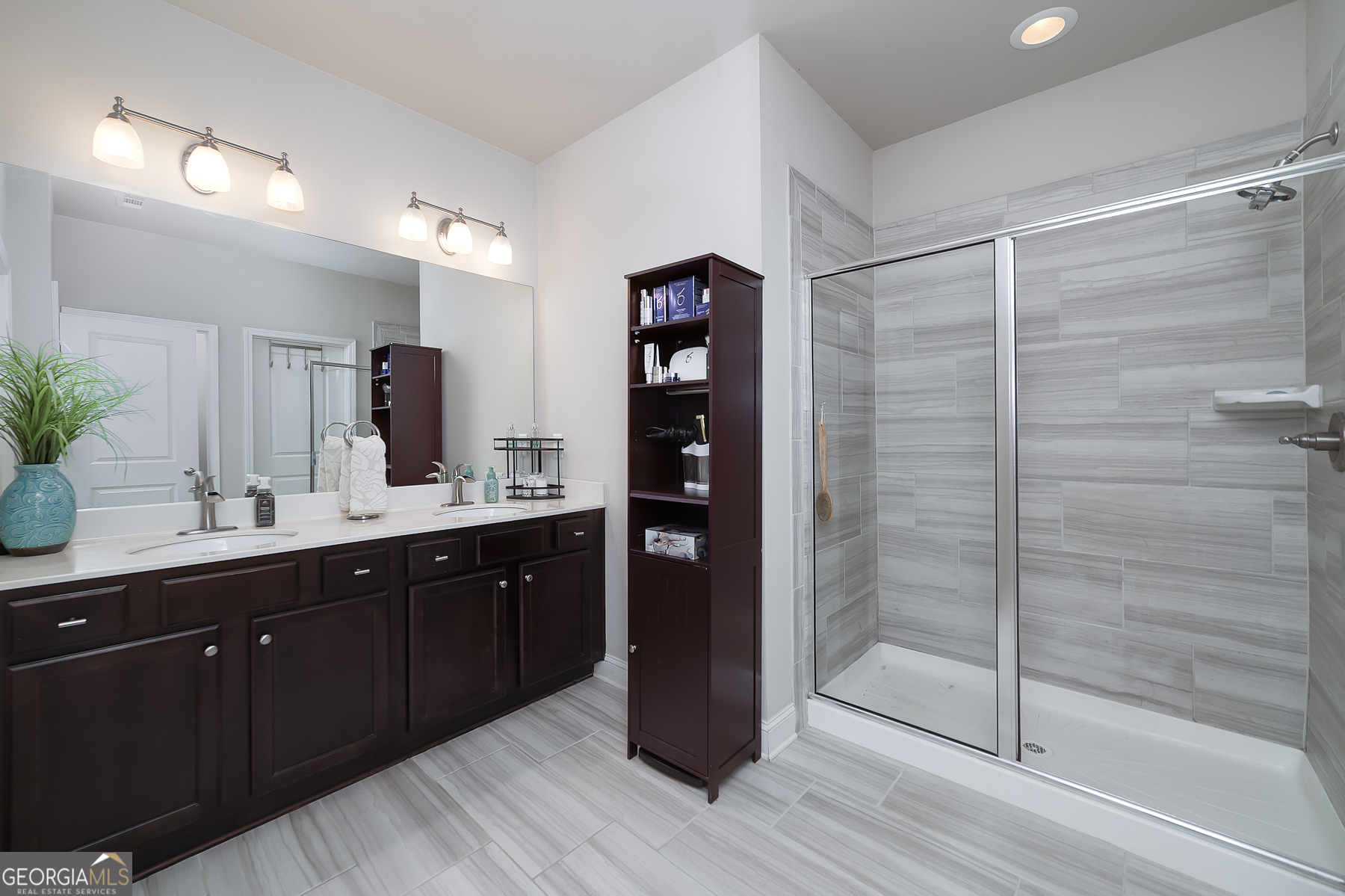 4366 Clubside Drive Gainesville, GA 30504 - Photo 11 of 24 a bathroom with a double vanity sink and shower