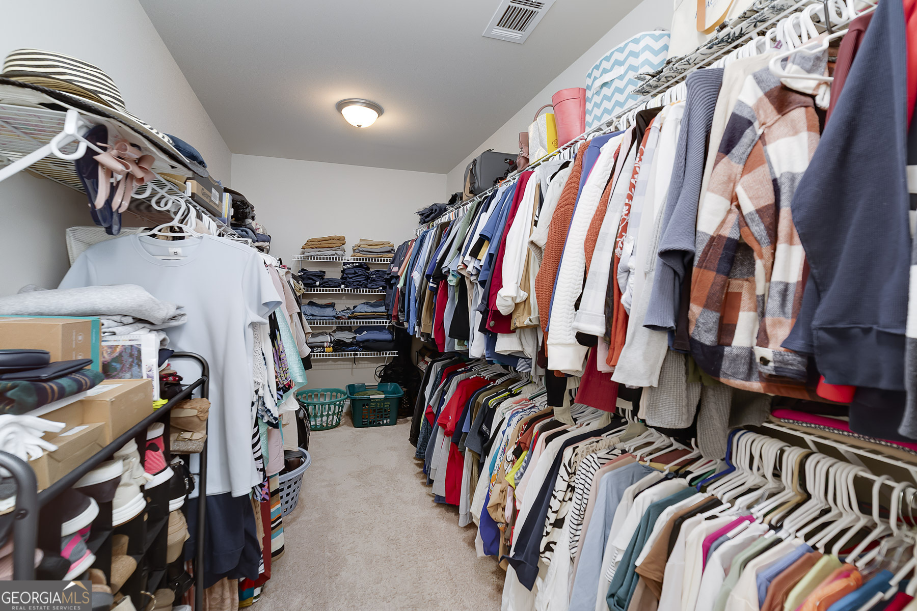 4366 Clubside Drive Gainesville, GA 30504 - Photo 13 of 24 a view of walk in closet with clothes