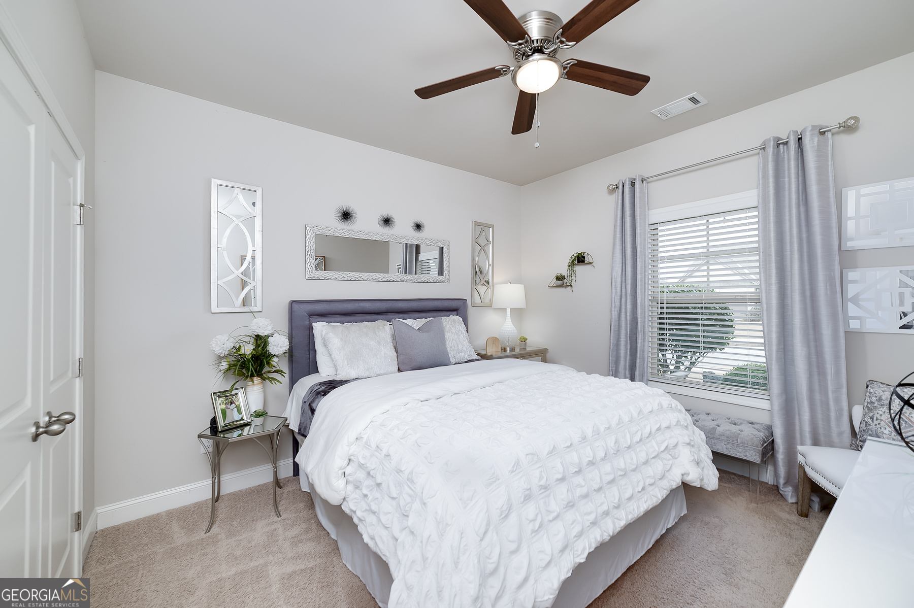 4366 Clubside Drive Gainesville, GA 30504 - Photo 15 of 24 a bedroom with a large bed and a large window