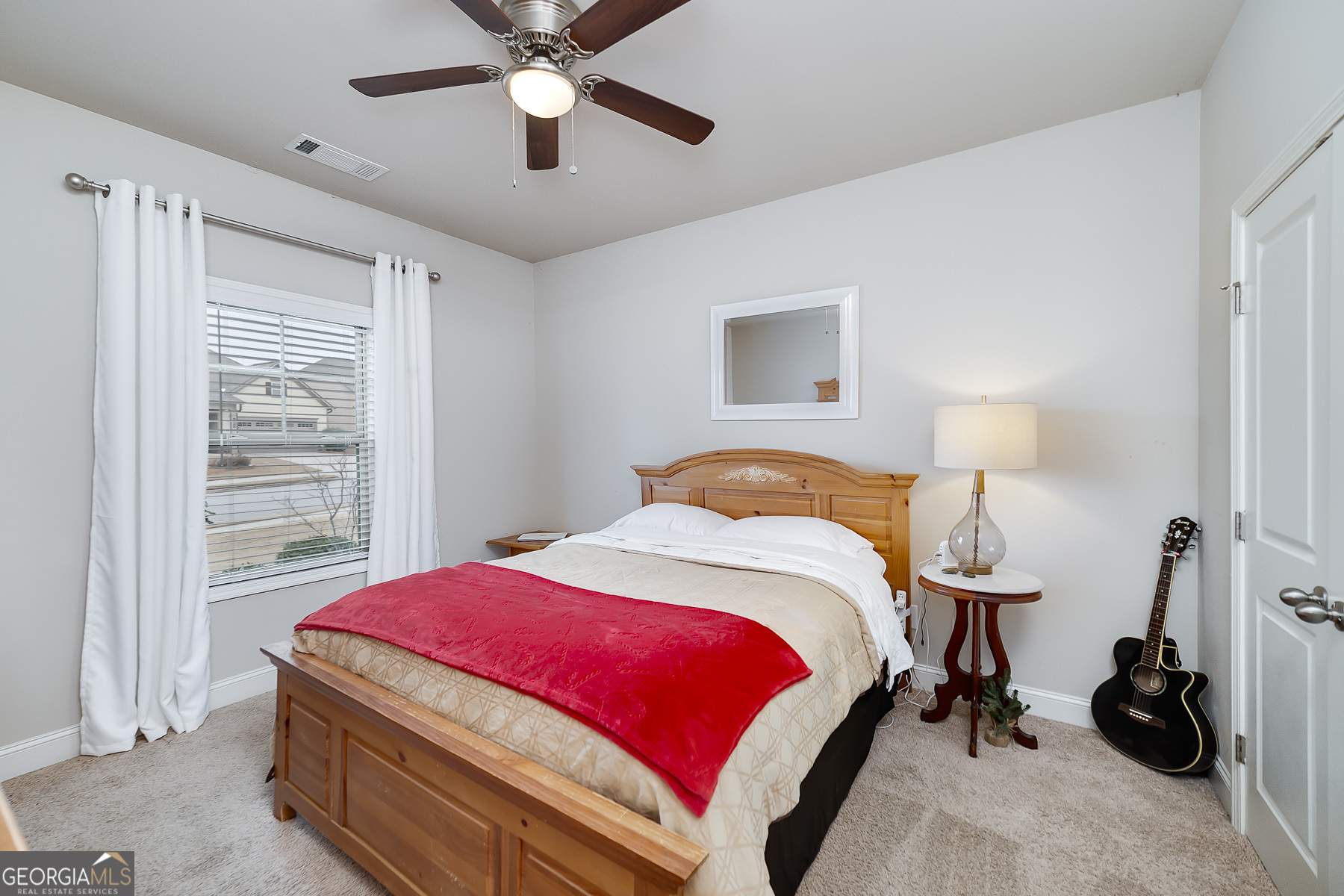 4366 Clubside Drive Gainesville, GA 30504 - Photo 17 of 24 a bedroom with a bed and a window