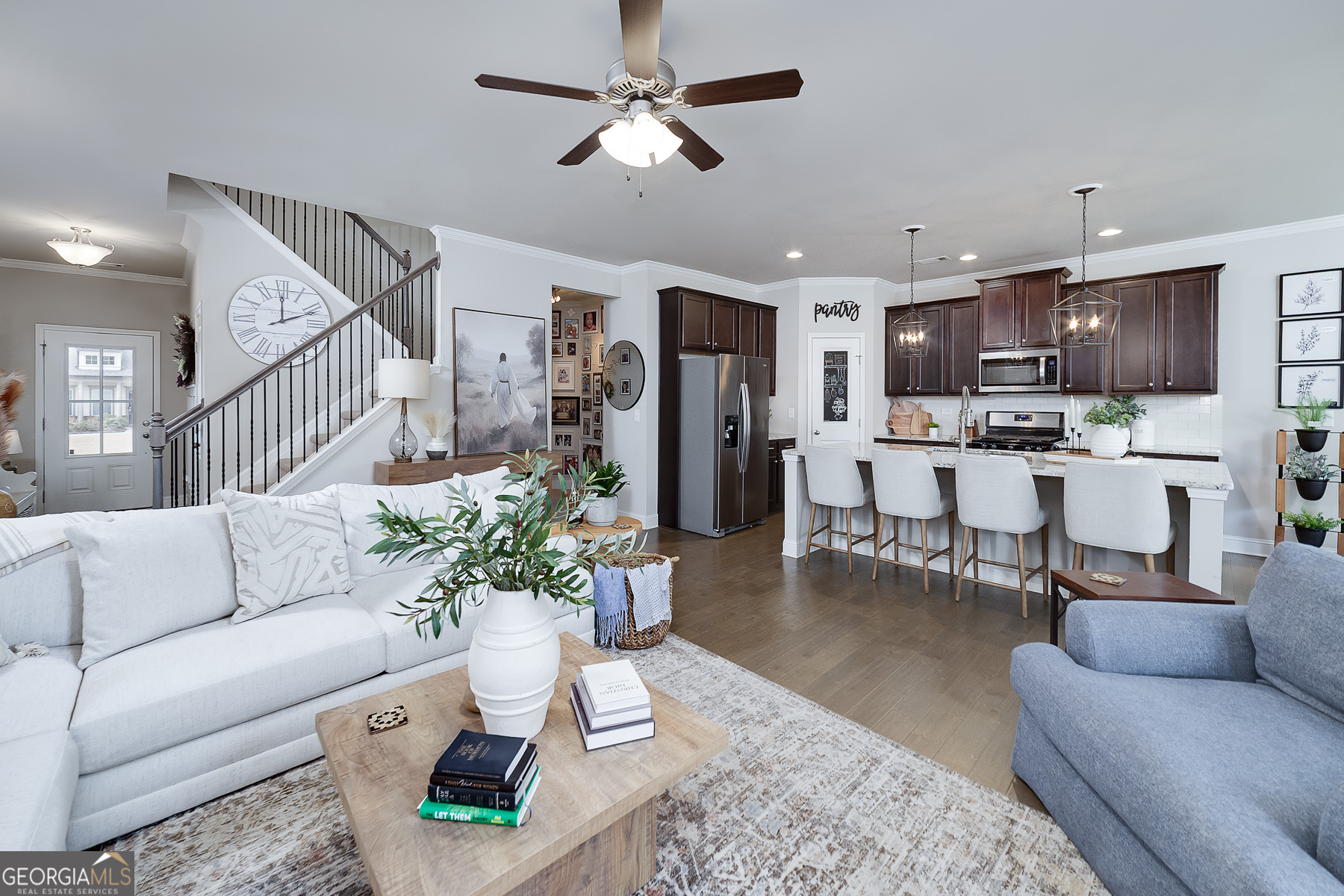 4366 Clubside Drive Gainesville, GA 30504 - Photo 6 of 24 a living room with furniture potted plant and kitchen view
