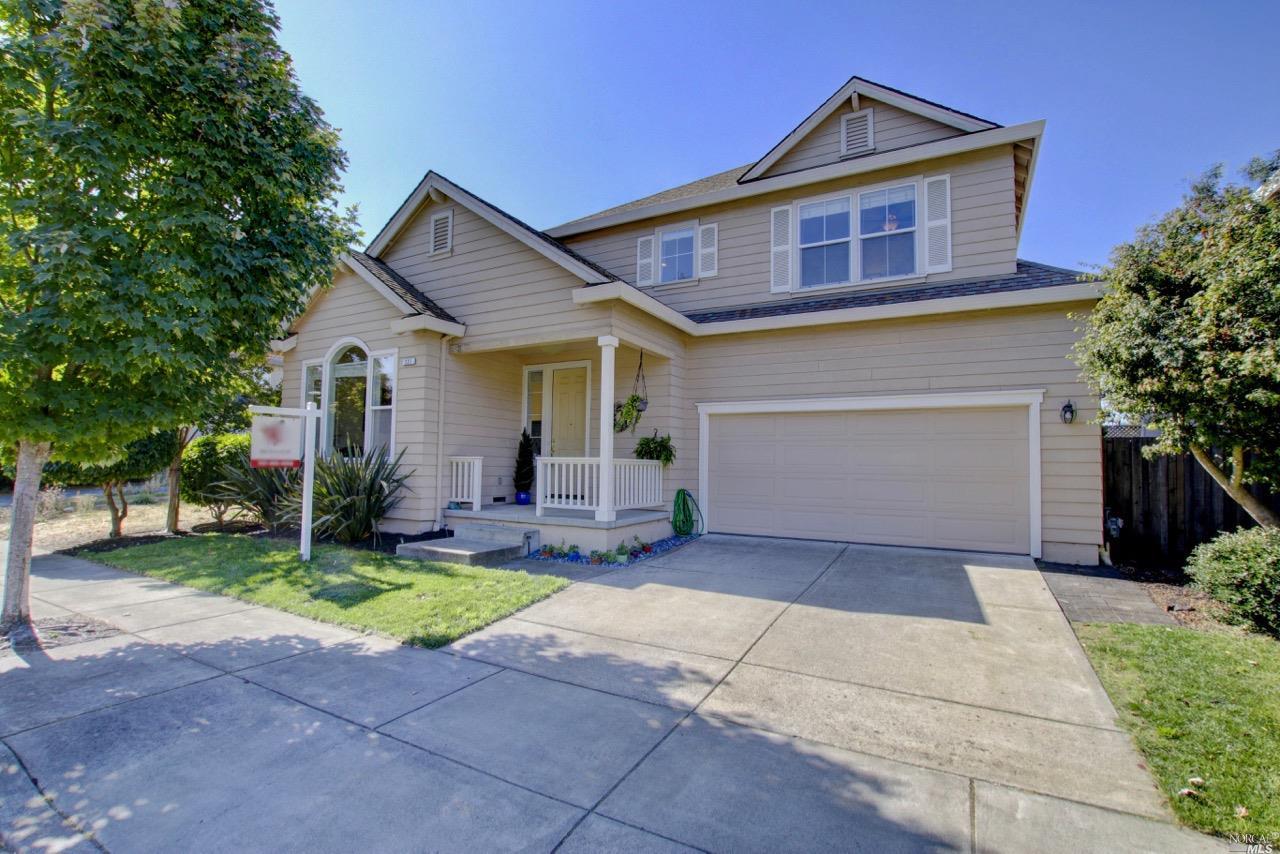 321 Hansbery Way Santa Rosa, CA 95409 - Photo 1 of 1 a front view of a house with a yard and garage