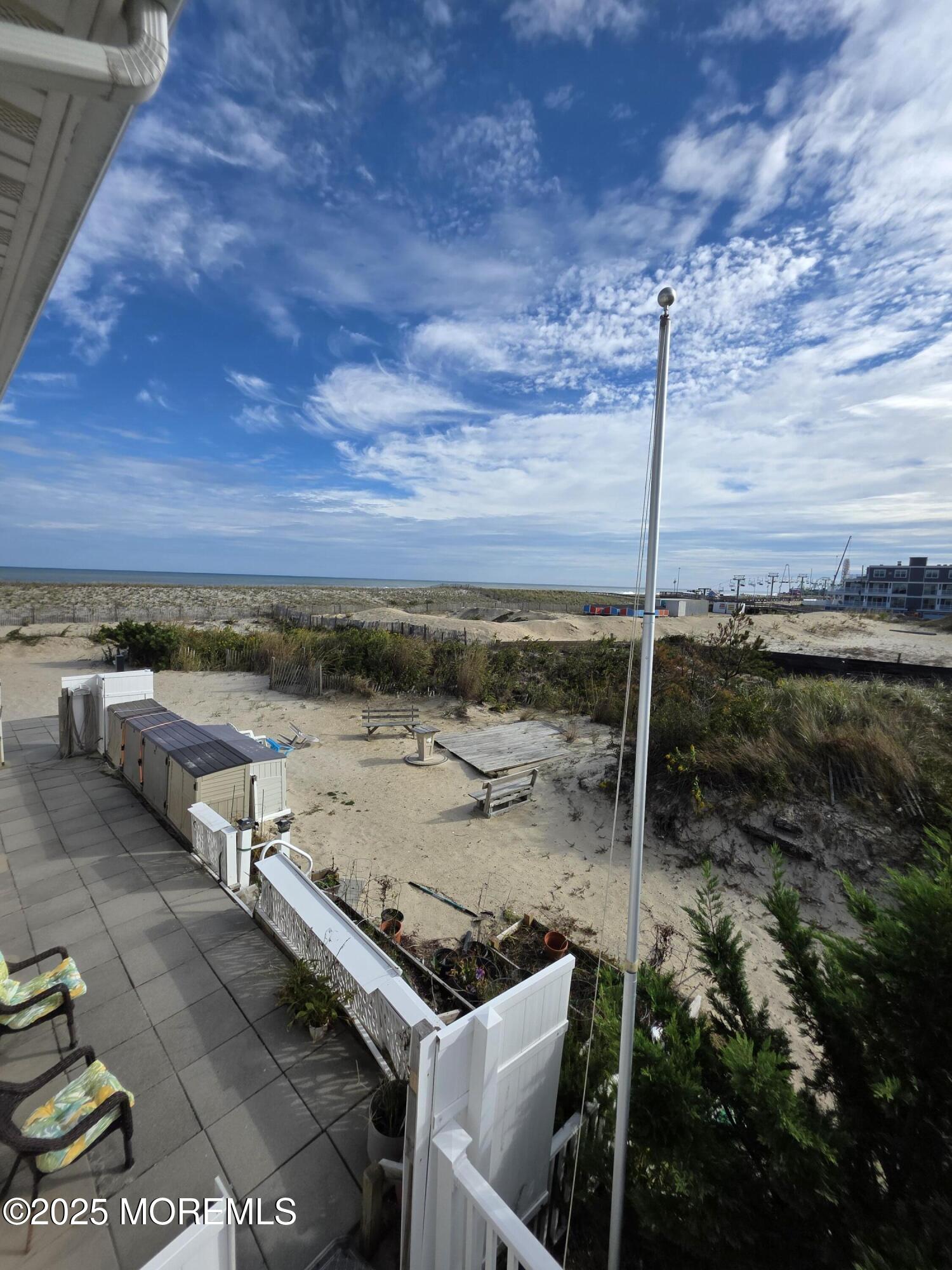 42 Dune Terrace Seaside Heights, NJ 08751 - Photo 11 of 17 a view of a terrace with wooden floor and city view