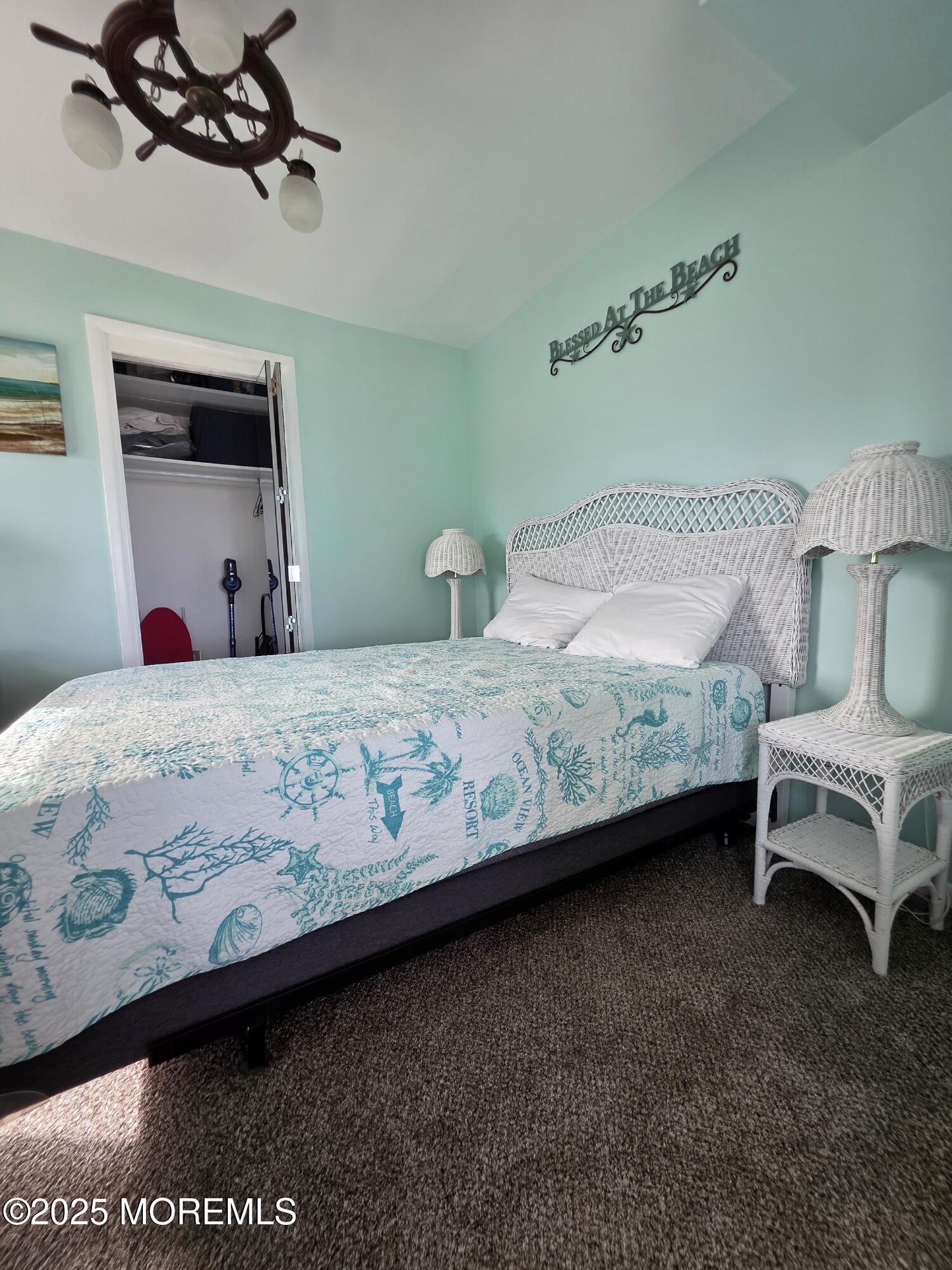 42 Dune Terrace Seaside Heights, NJ 08751 - Photo 15 of 17 a bedroom with a bed a couch and dresser