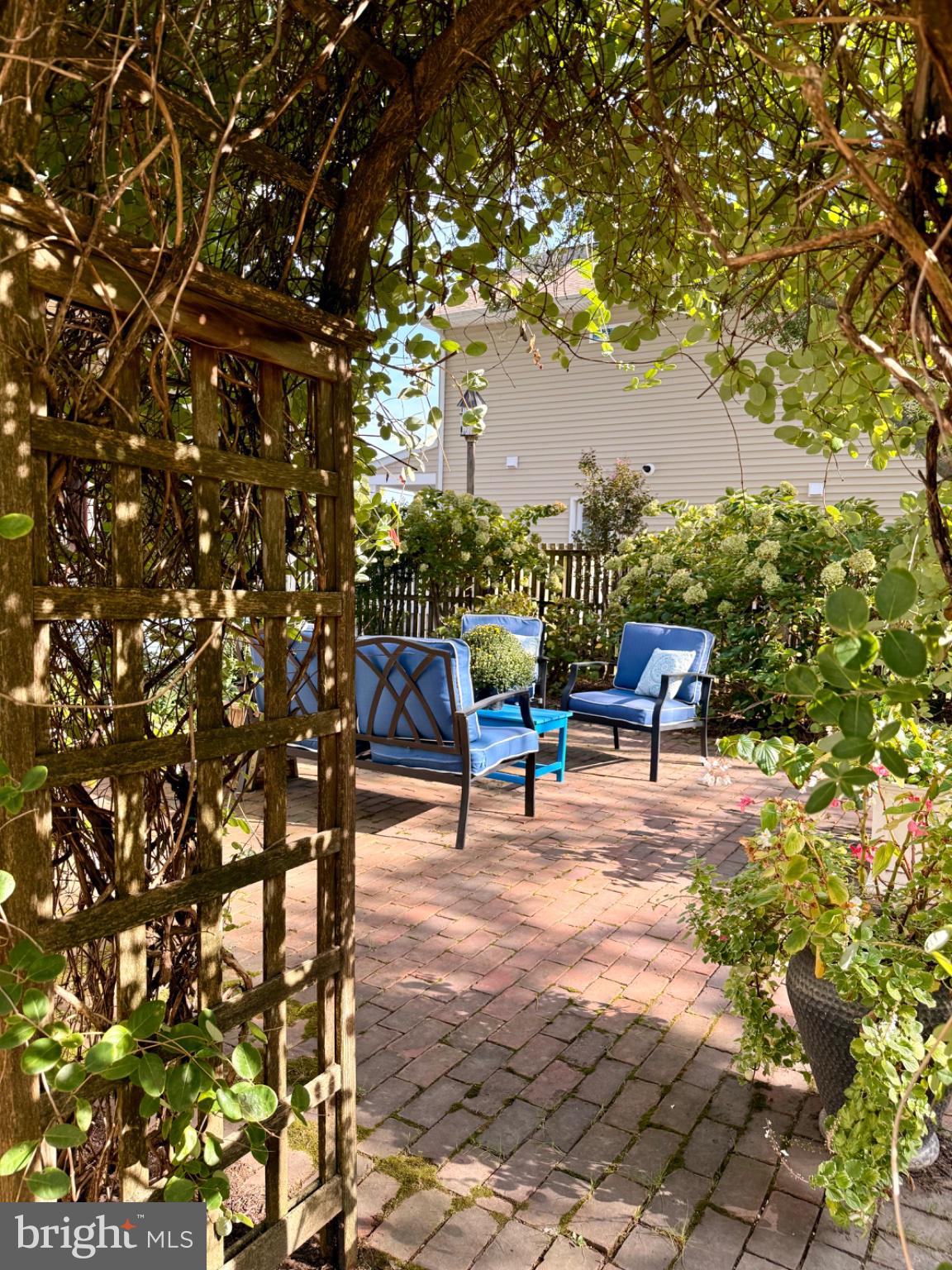 700 South Talbot Street St. Michaels, MD 21663 - Photo 7 of 83 Through the garden trellis...