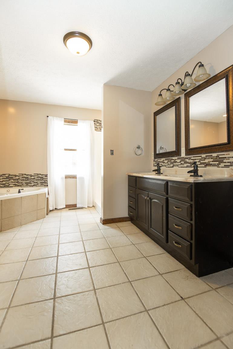 101 Spring Creek Road Waverly, TN 37185 - Photo 18 of 30 Tile Floors and Tile Tub Surround