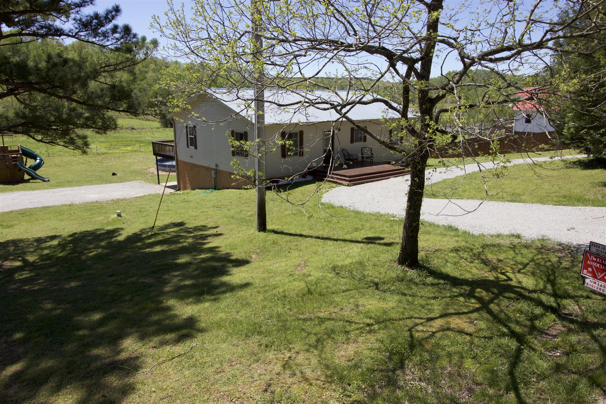 101 Spring Creek Road Waverly, TN 37185 - Photo 4 of 30 New Front Deck, Landscaping, Shutters - Major Curb Appeal!