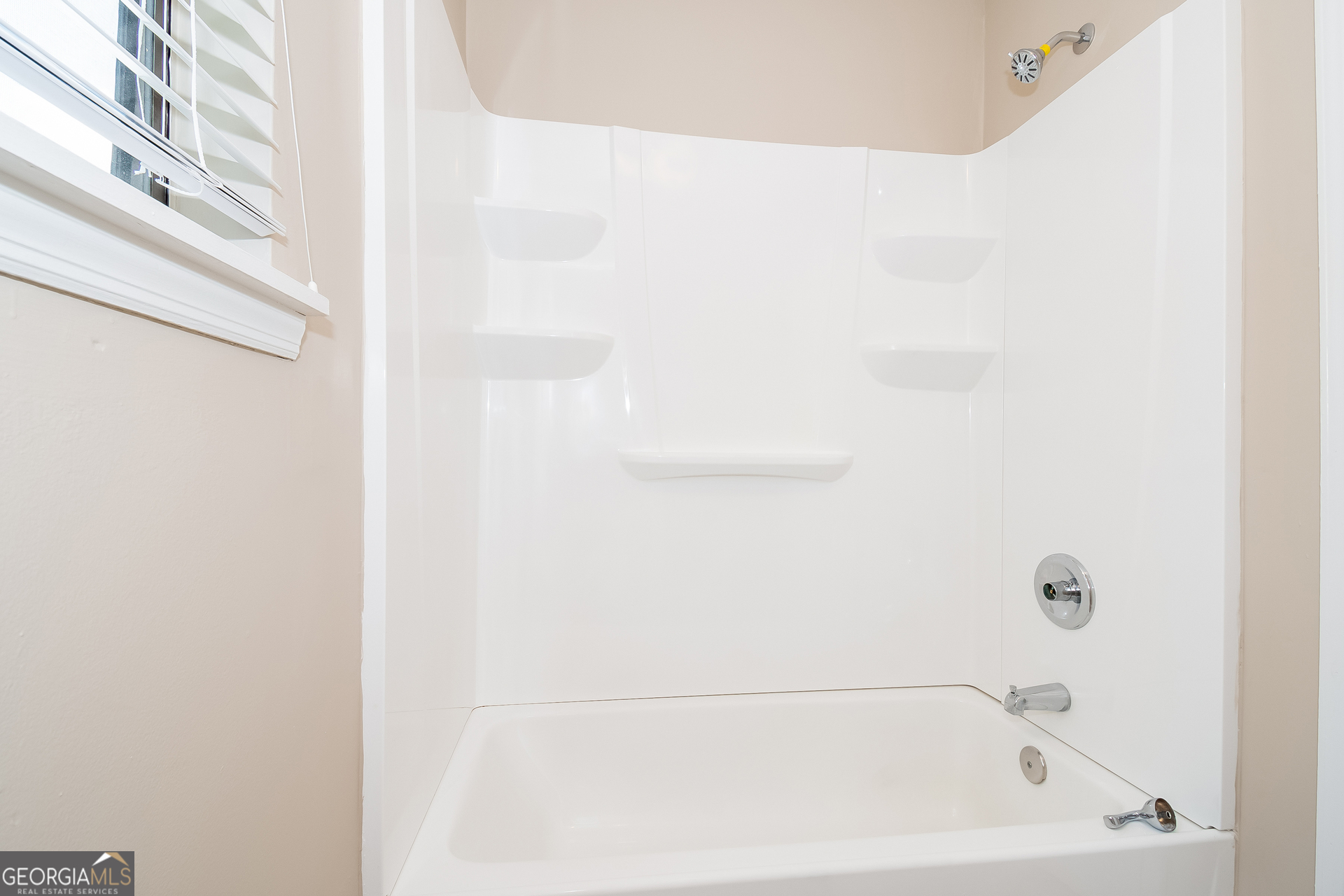 2264 Rocklane Drive Conley, GA 30288 - Photo 13 of 15 a close up of a bathtub