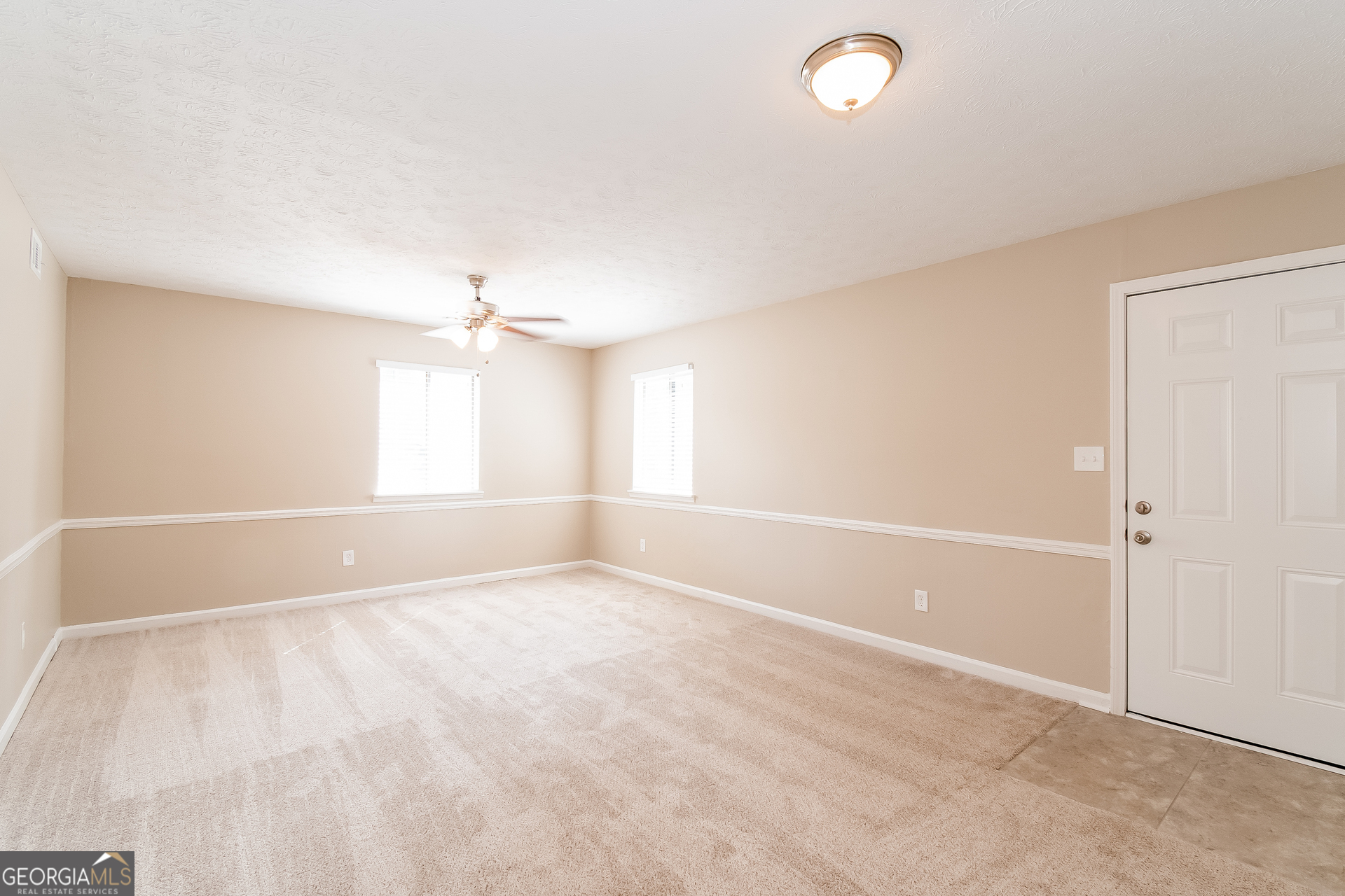 2264 Rocklane Drive Conley, GA 30288 - Photo 7 of 15 a view of an empty room with a window