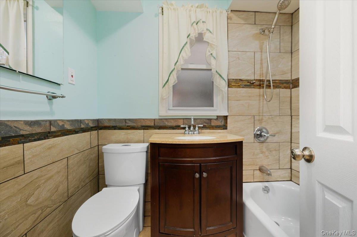 22 Sunset Trail, Unit 22 Bronx, NY 10465 - Photo 11 of 21 a bathroom with a sink toilet and shower
