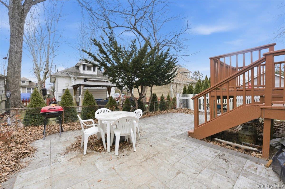 22 Sunset Trail, Unit 22 Bronx, NY 10465 - Photo 19 of 21 a view of a chairs and table in the patio