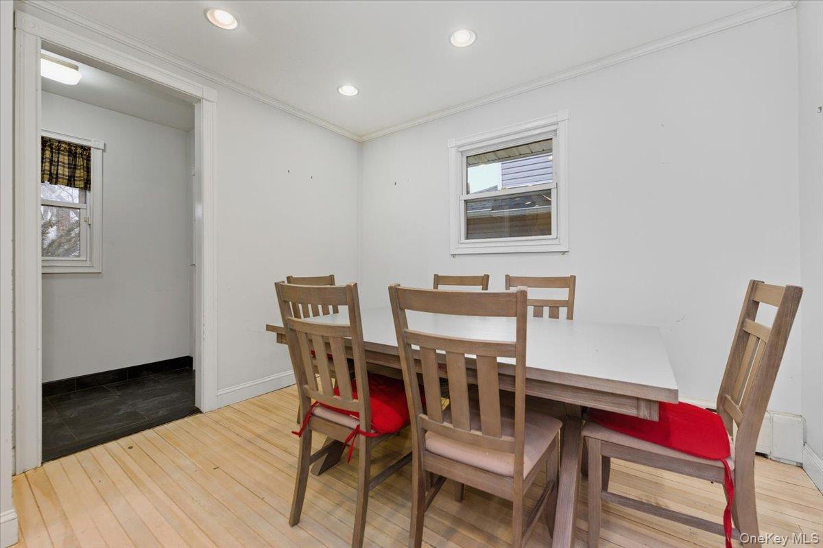 22 Sunset Trail, Unit 22 Bronx, NY 10465 - Photo 4 of 21 a view of a dining room with furniture and wooden floor