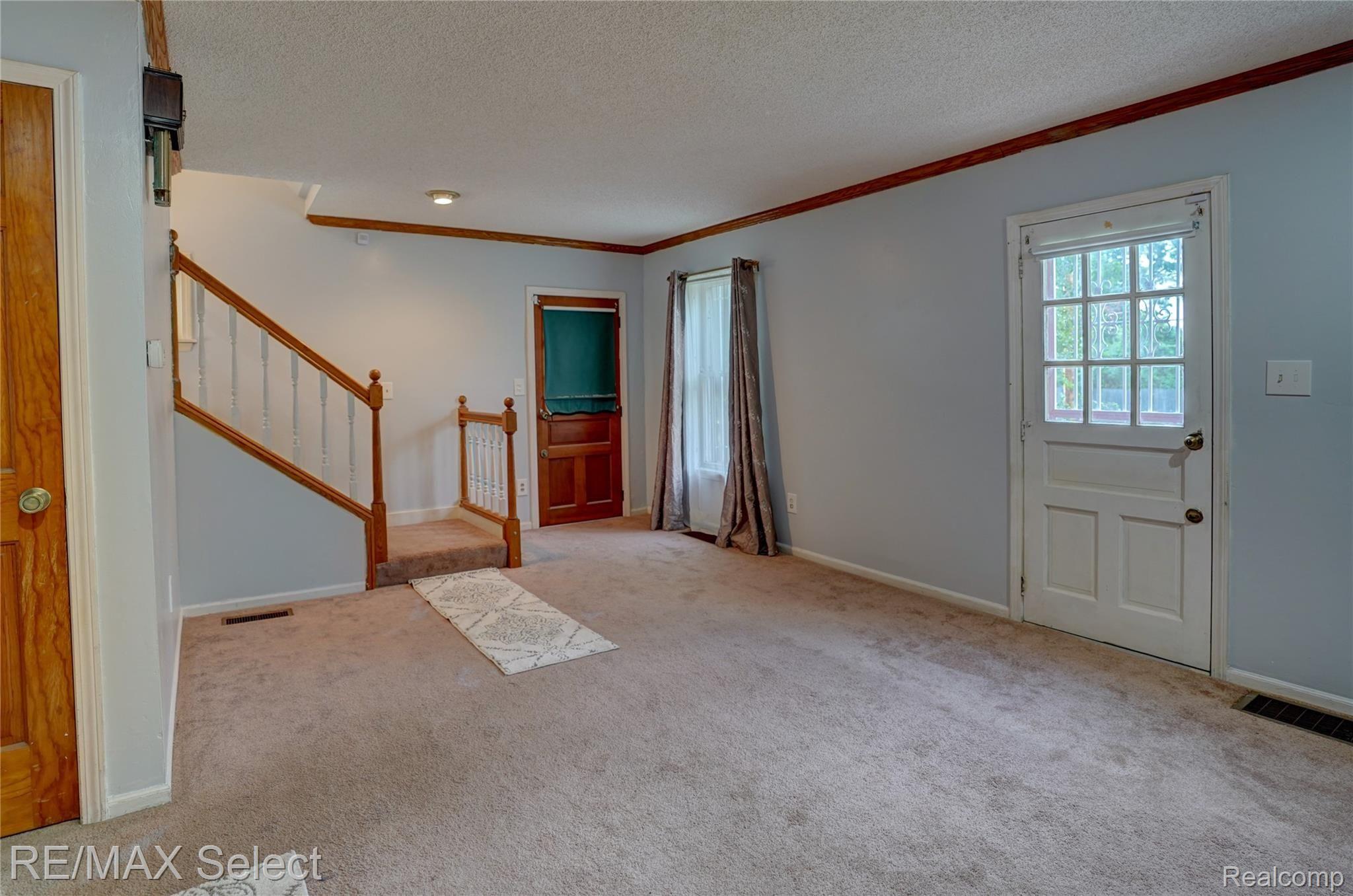 2742 Miller Road Flint, MI 48503 - Photo 13 of 35 Living room to upstais.jpg