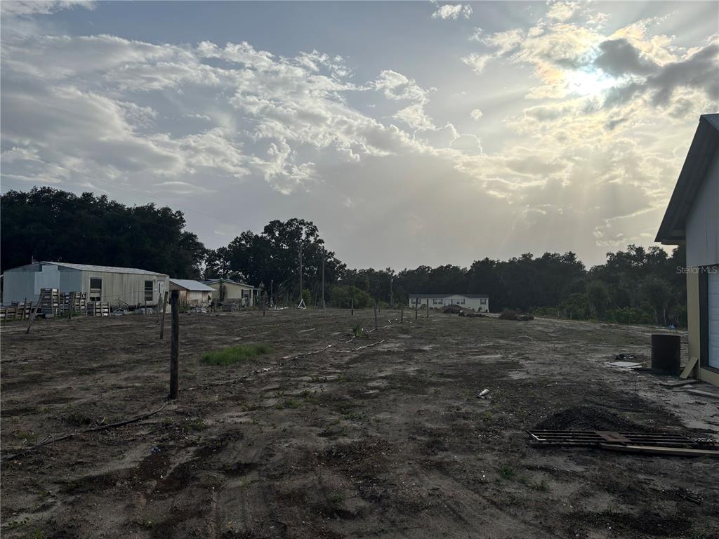 7117 South County Line Road Plant City, FL 33567 - Photo 12 of 15 a view of a yard with wooden fence