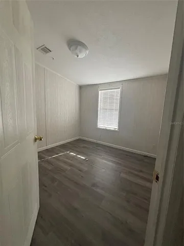 a view of a backyard of a house