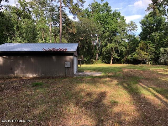 2109 Cornell Road Middleburg, FL 32068 - Photo 1 of 5 a view of outdoor space with trees
