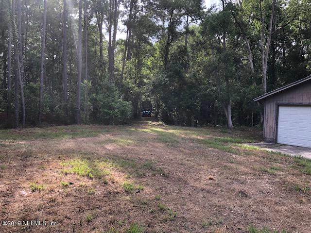 2109 Cornell Road Middleburg, FL 32068 - Photo 2 of 5 a view of a yard with trees