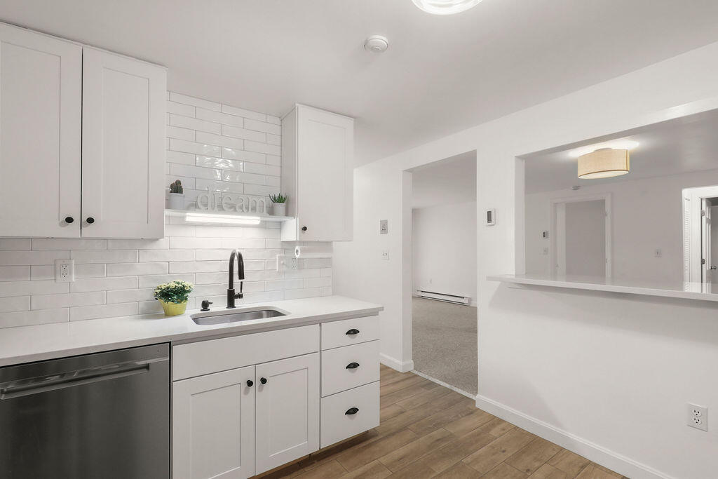 17 Highview Drive, Unit 17 Sandwich, MA 02563 - Photo 19 of 32 a kitchen with cabinets stainless steel appliances and a sink