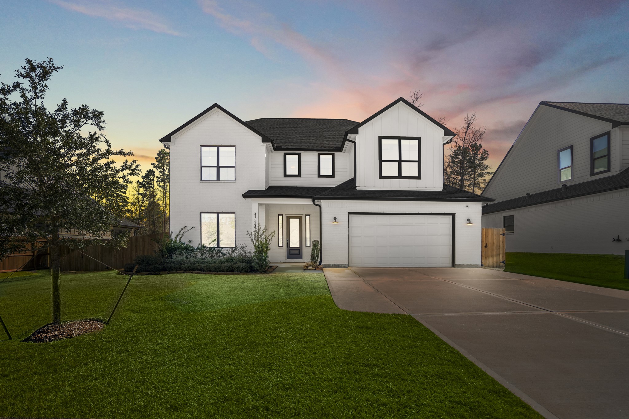 21255 Hidden Bend Loop Magnolia, TX 77354 - Photo 1 of 44 a front view of a house with a yard and entryway