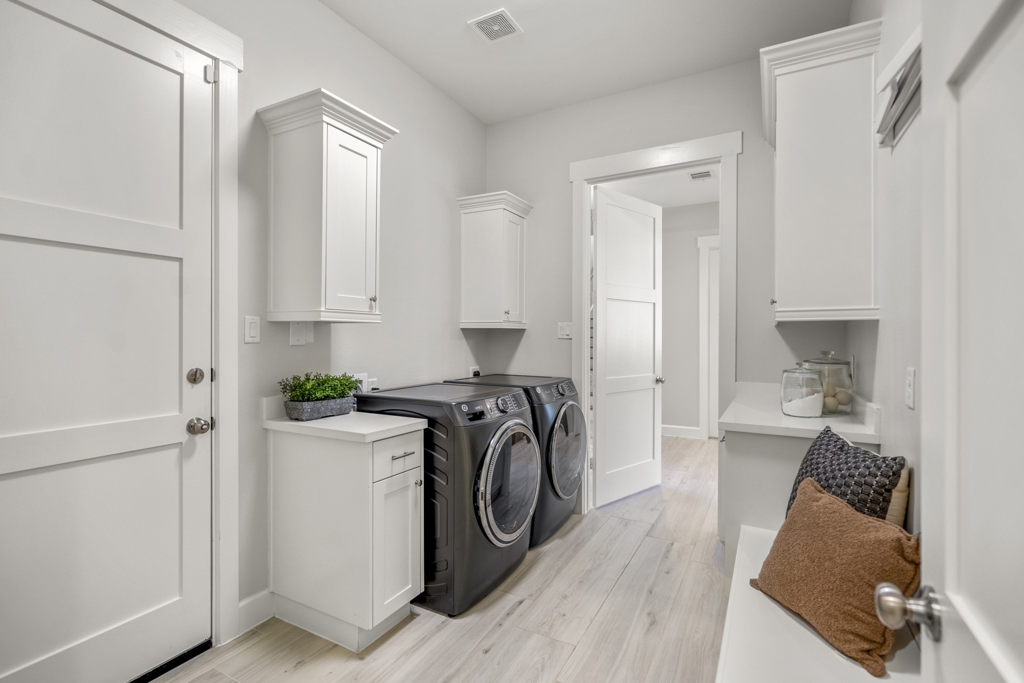 21255 Hidden Bend Loop Magnolia, TX 77354 - Photo 24 of 44 a view of a kitchen with sink washer and dryer