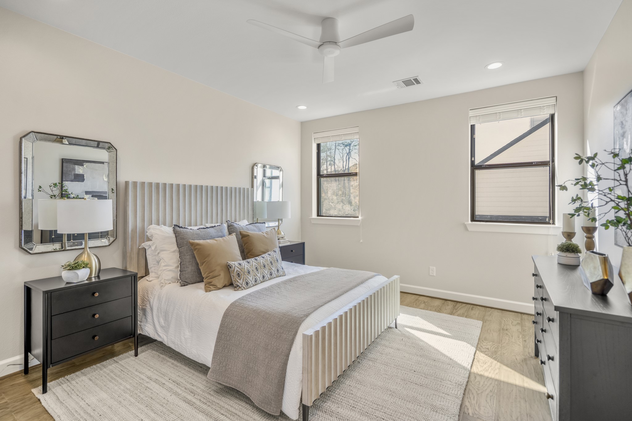 21255 Hidden Bend Loop Magnolia, TX 77354 - Photo 33 of 44 a bedroom with a bed and wooden floor