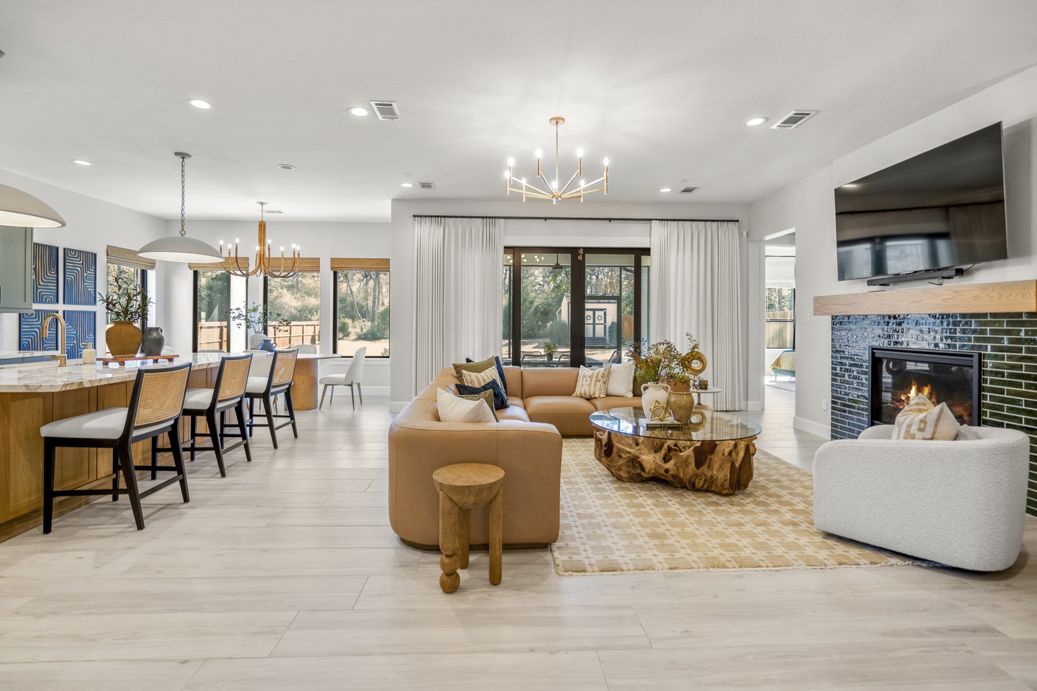 21255 Hidden Bend Loop Magnolia, TX 77354 - Photo 44 of 44 a living room with furniture and a flat screen tv