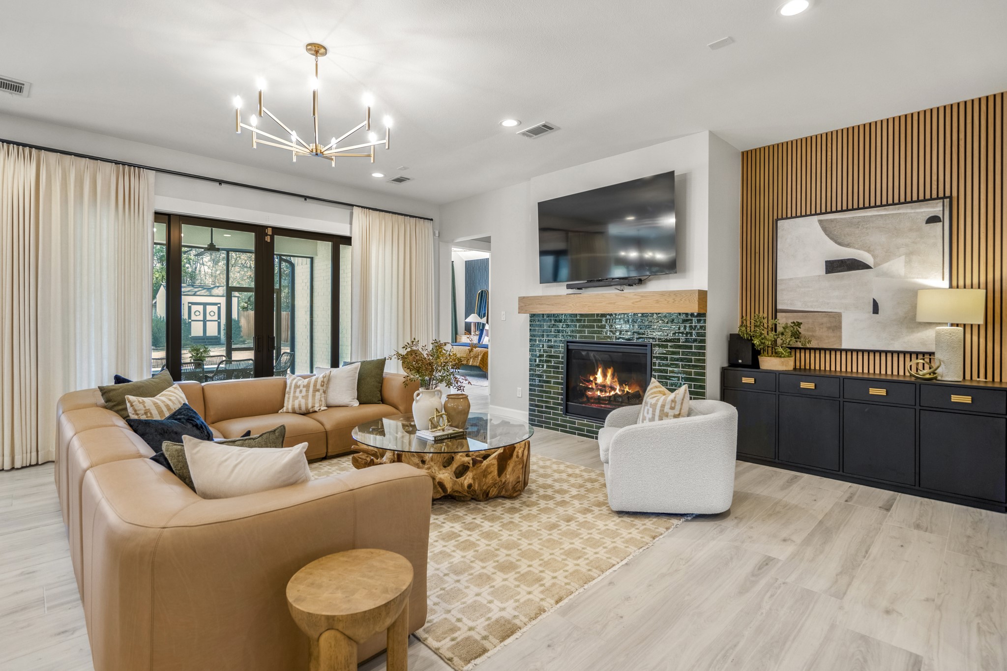 21255 Hidden Bend Loop Magnolia, TX 77354 - Photo 8 of 44 a living room with furniture and a fireplace