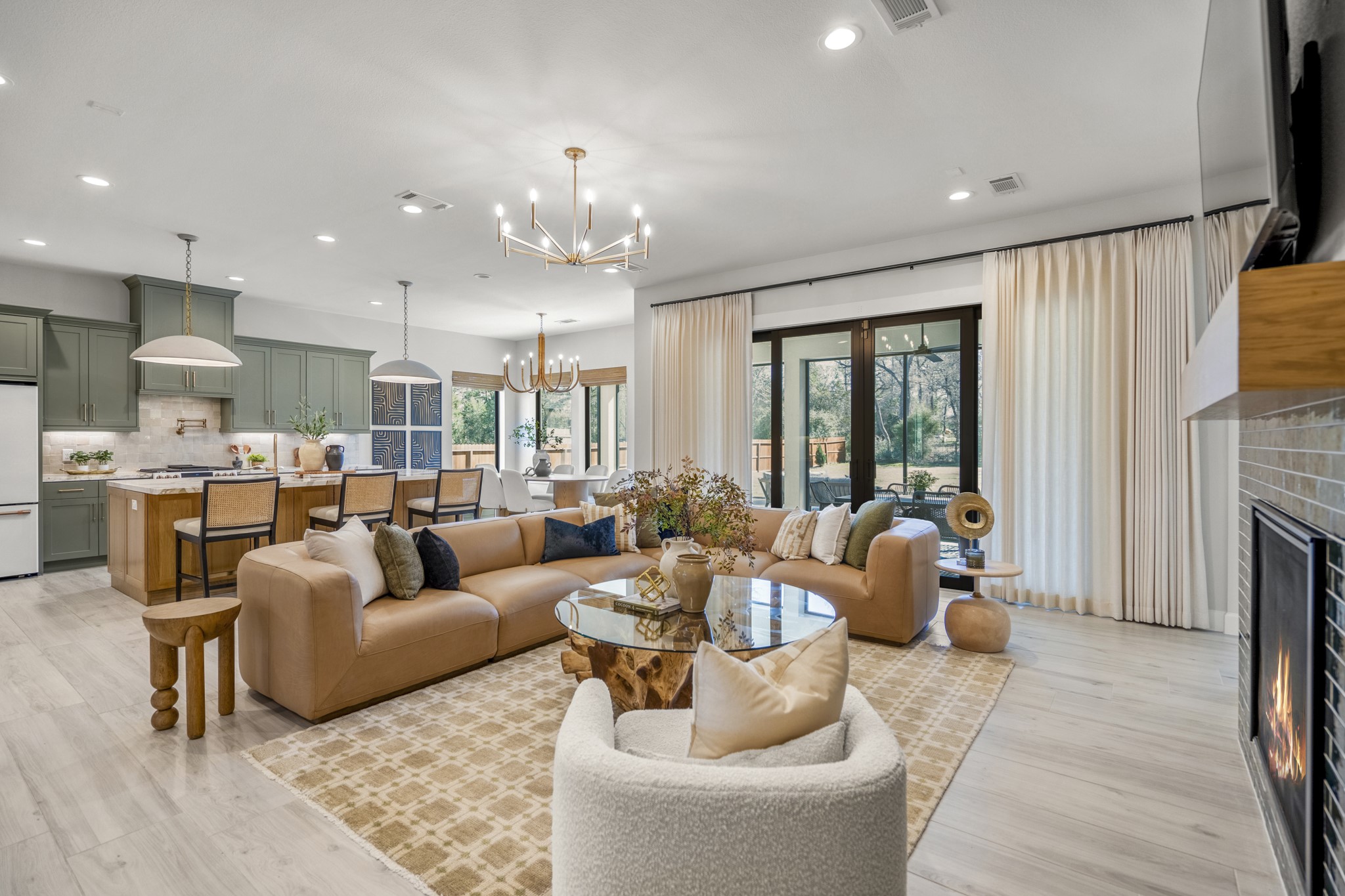 21255 Hidden Bend Loop Magnolia, TX 77354 - Photo 9 of 44 a living room with fireplace furniture and a large window