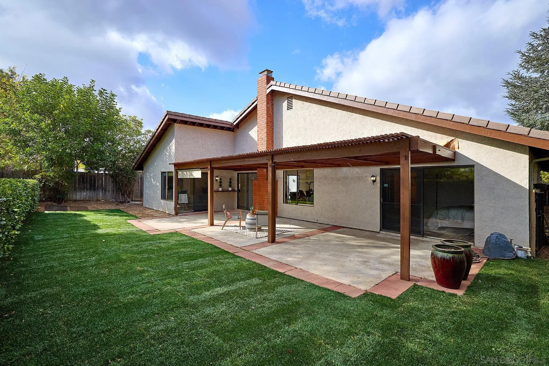 13269 Vinter Way Poway, CA 92064 - Photo 14 of 32 a view of a house with backyard porch and sitting area