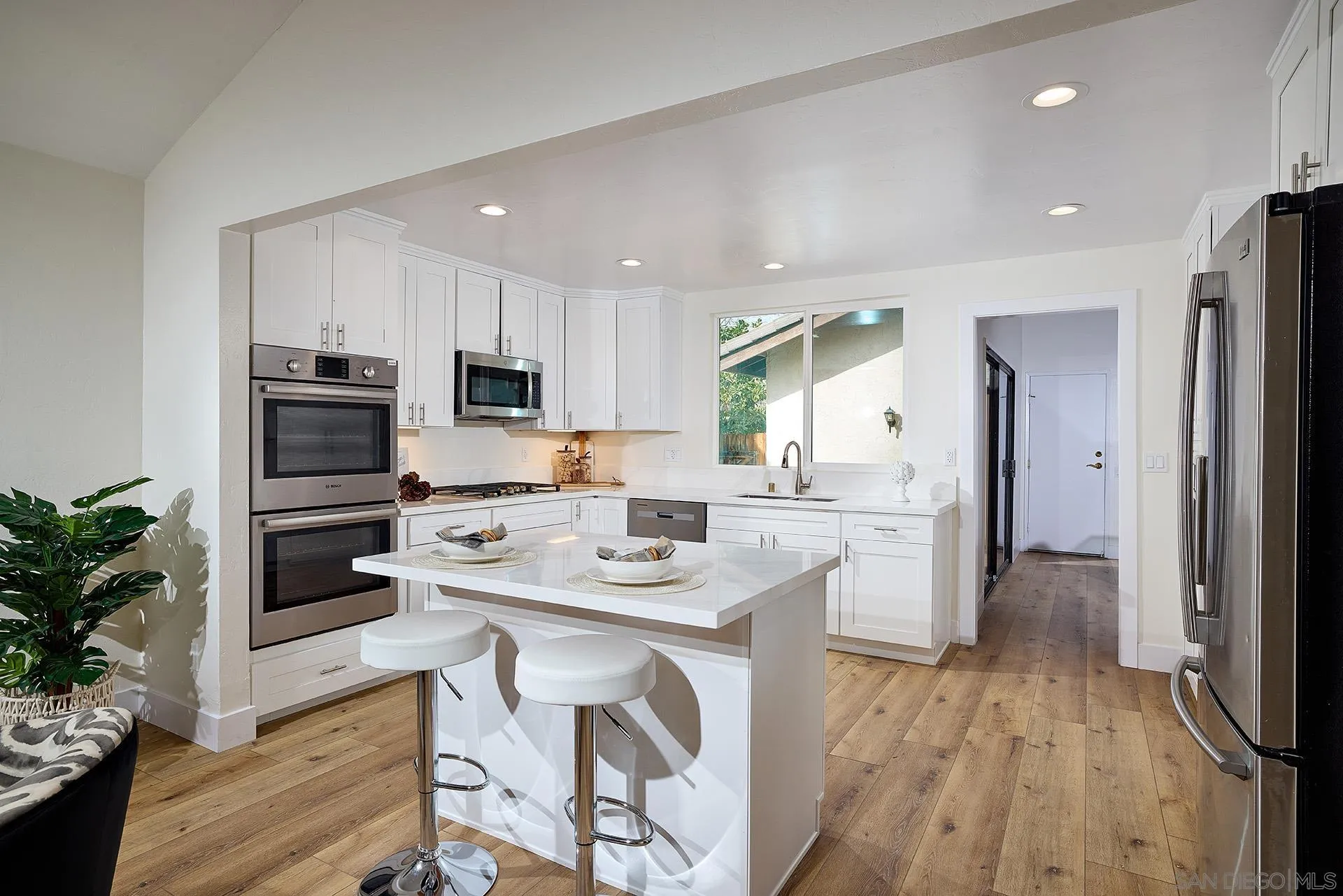 13269 Vinter Way Poway, CA 92064 - Photo 19 of 32 a kitchen with a sink a counter space appliances and cabinets