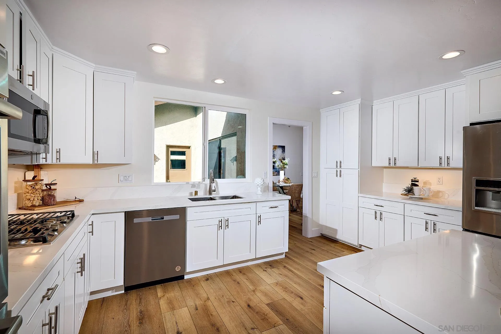 13269 Vinter Way Poway, CA 92064 - Photo 20 of 32 a large kitchen with cabinets and stainless steel appliances