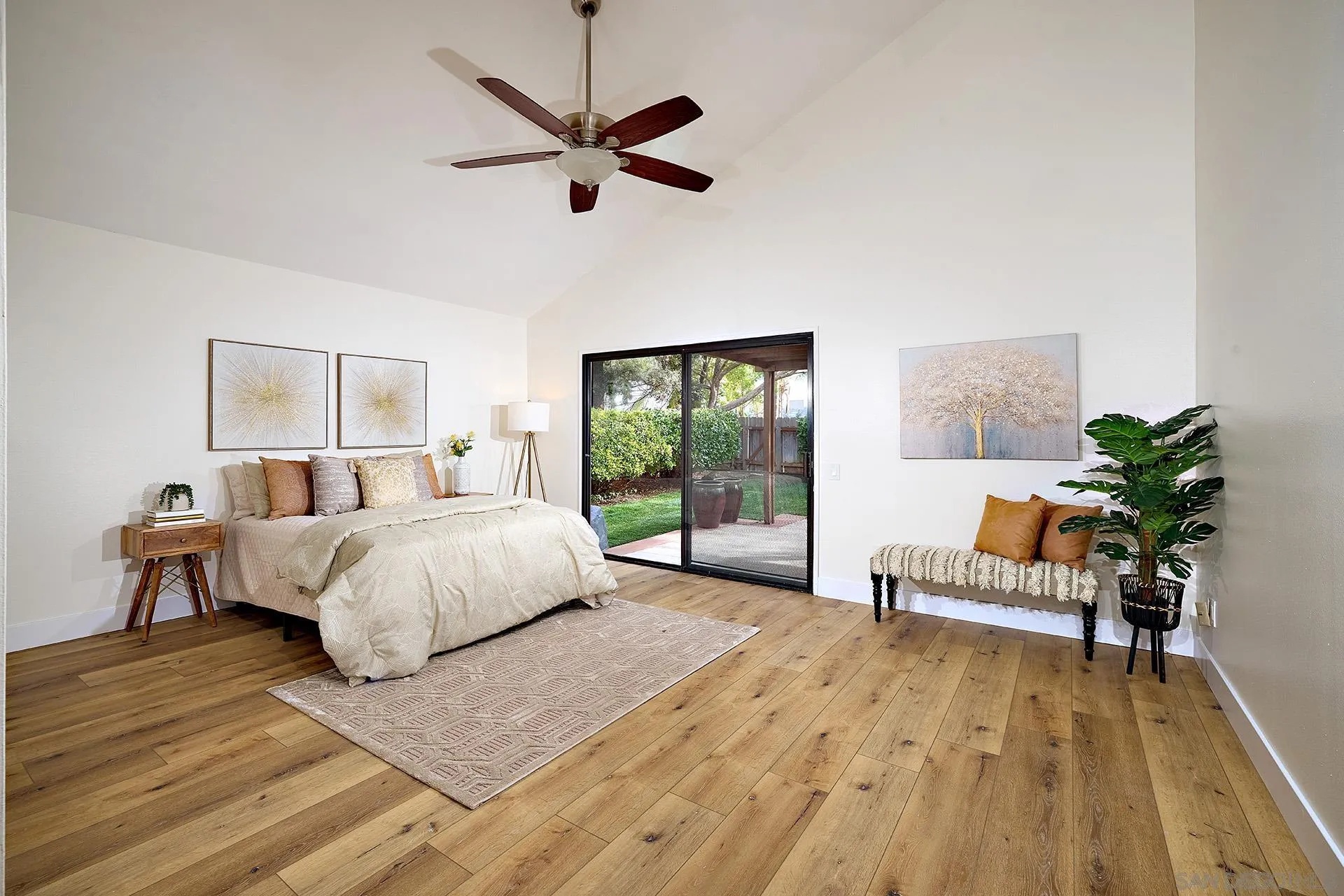 13269 Vinter Way Poway, CA 92064 - Photo 24 of 32 a bedroom with a bed and a chandelier