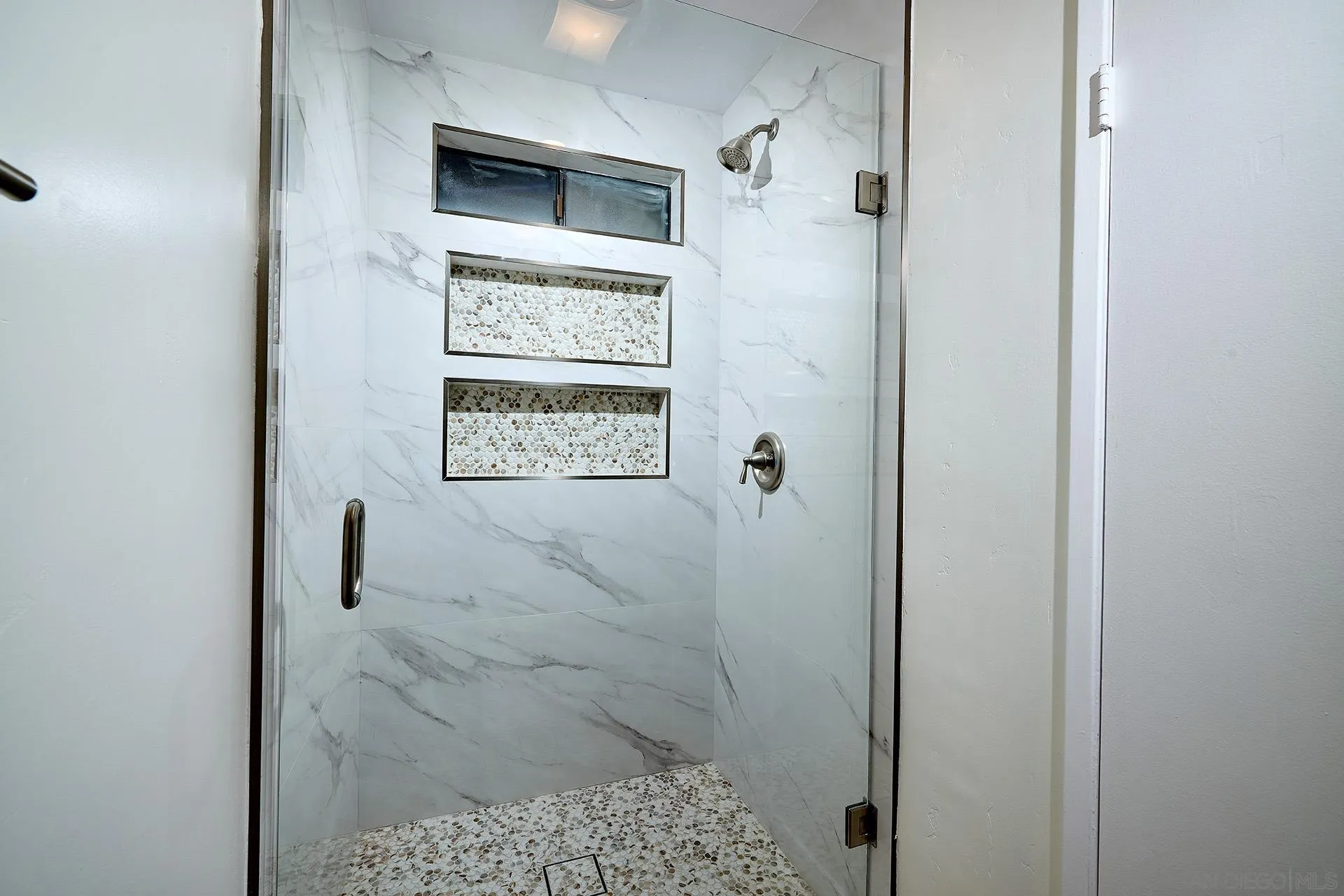 13269 Vinter Way Poway, CA 92064 - Photo 27 of 32 a bathroom with a shower and a sink