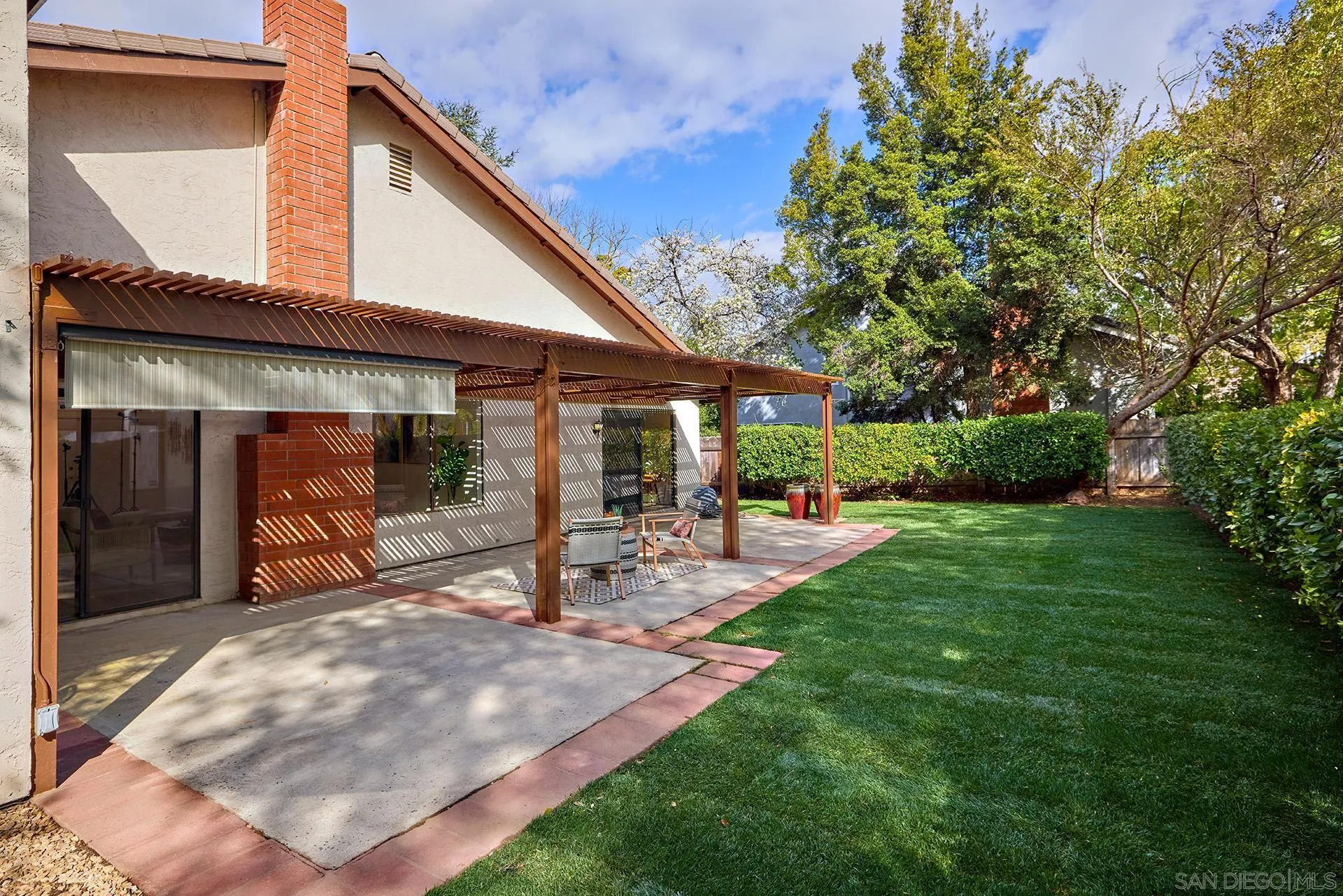13269 Vinter Way Poway, CA 92064 - Photo 10 of 32 a view of a house with backyard and porch