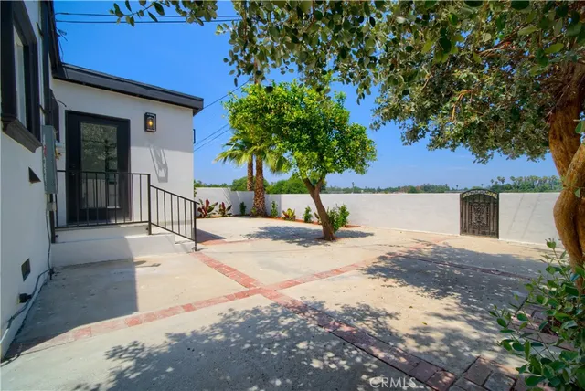 a house with trees in front of it
