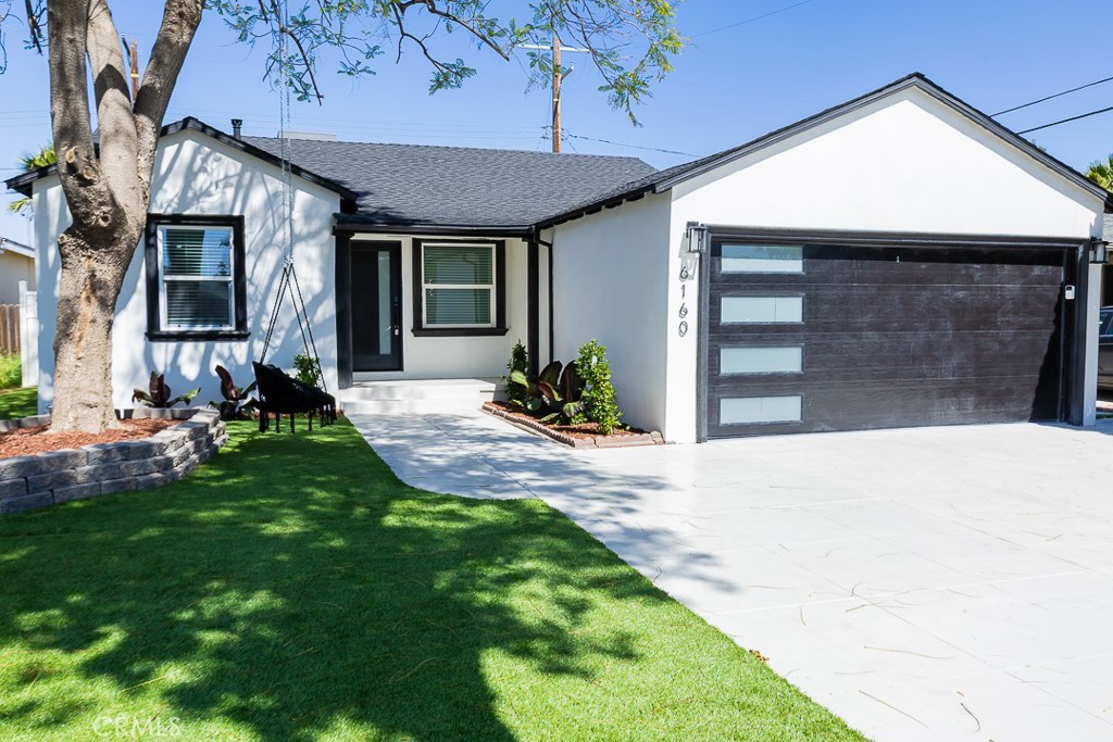 6160 Shoshone Avenue Encino, CA 91316 - Photo 16 of 22 a front view of a house with a yard