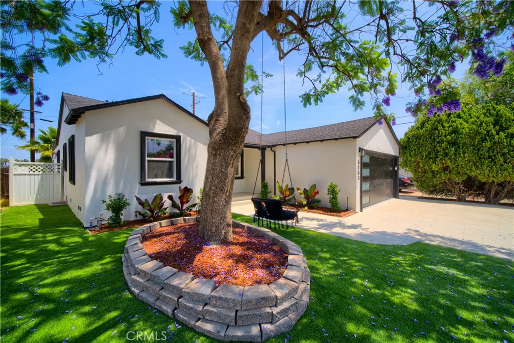 6160 Shoshone Avenue Encino, CA 91316 - Photo 18 of 22 a front view of a house with garden