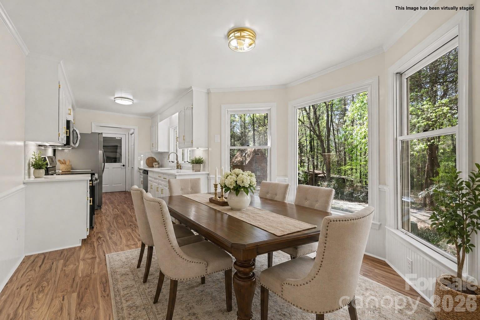 10542 Blair Road Mint Hill, NC 28227 - Photo 13 of 31 a view of a dining room with furniture window and outside view