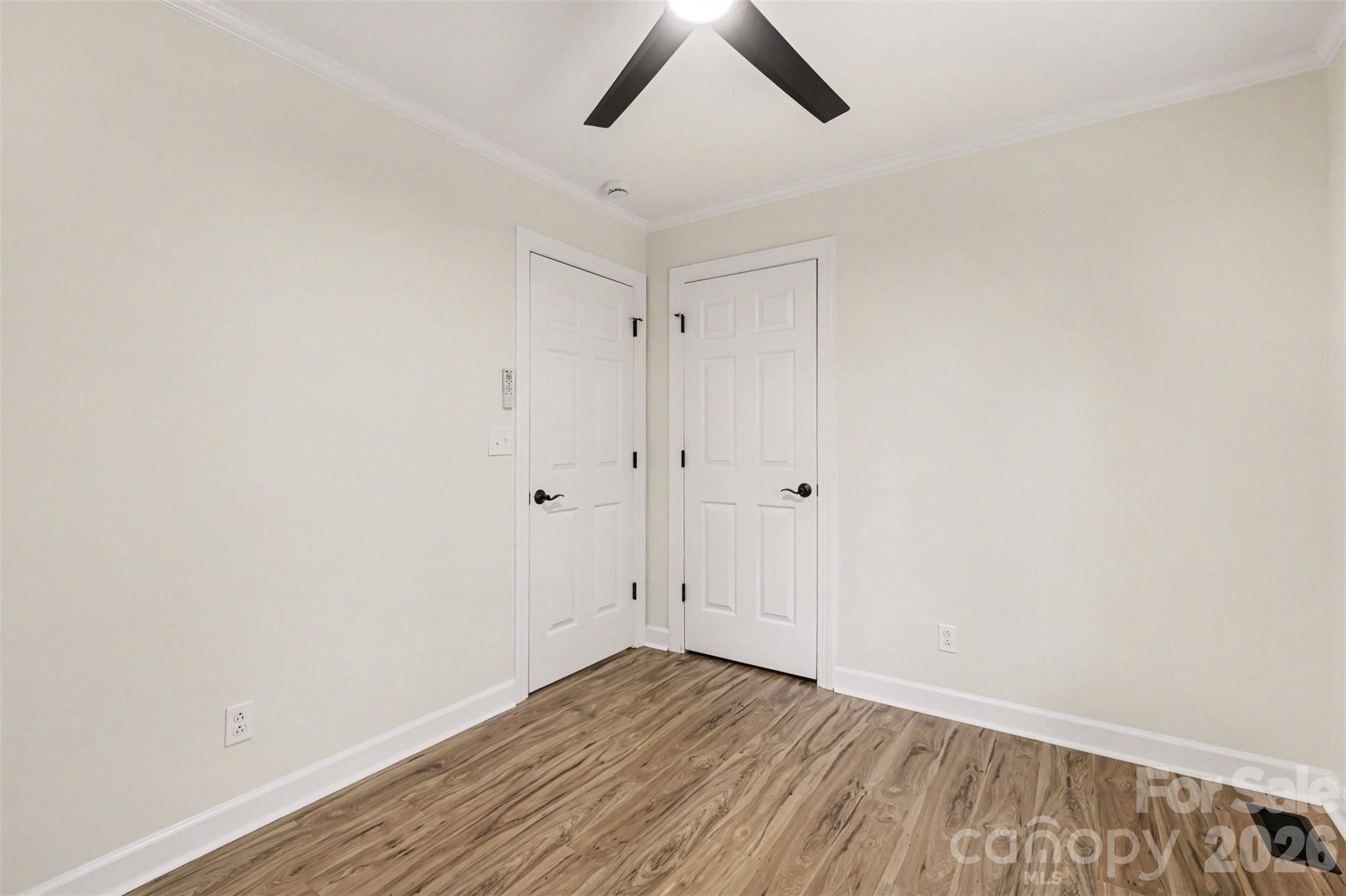 10542 Blair Road Mint Hill, NC 28227 - Photo 20 of 31 a view of an empty room with wooden floor