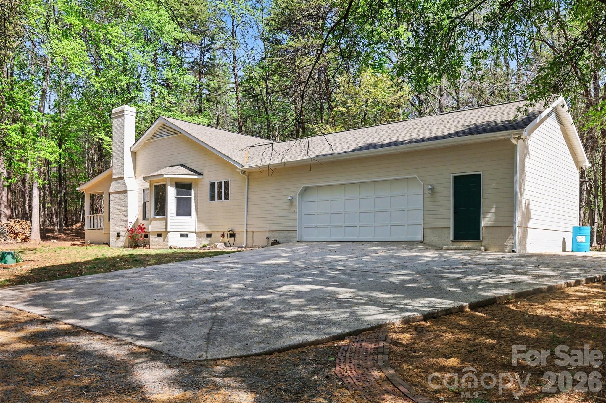 10542 Blair Road Mint Hill, NC 28227 - Photo 2 of 31 a view of a house with a yard and large tree