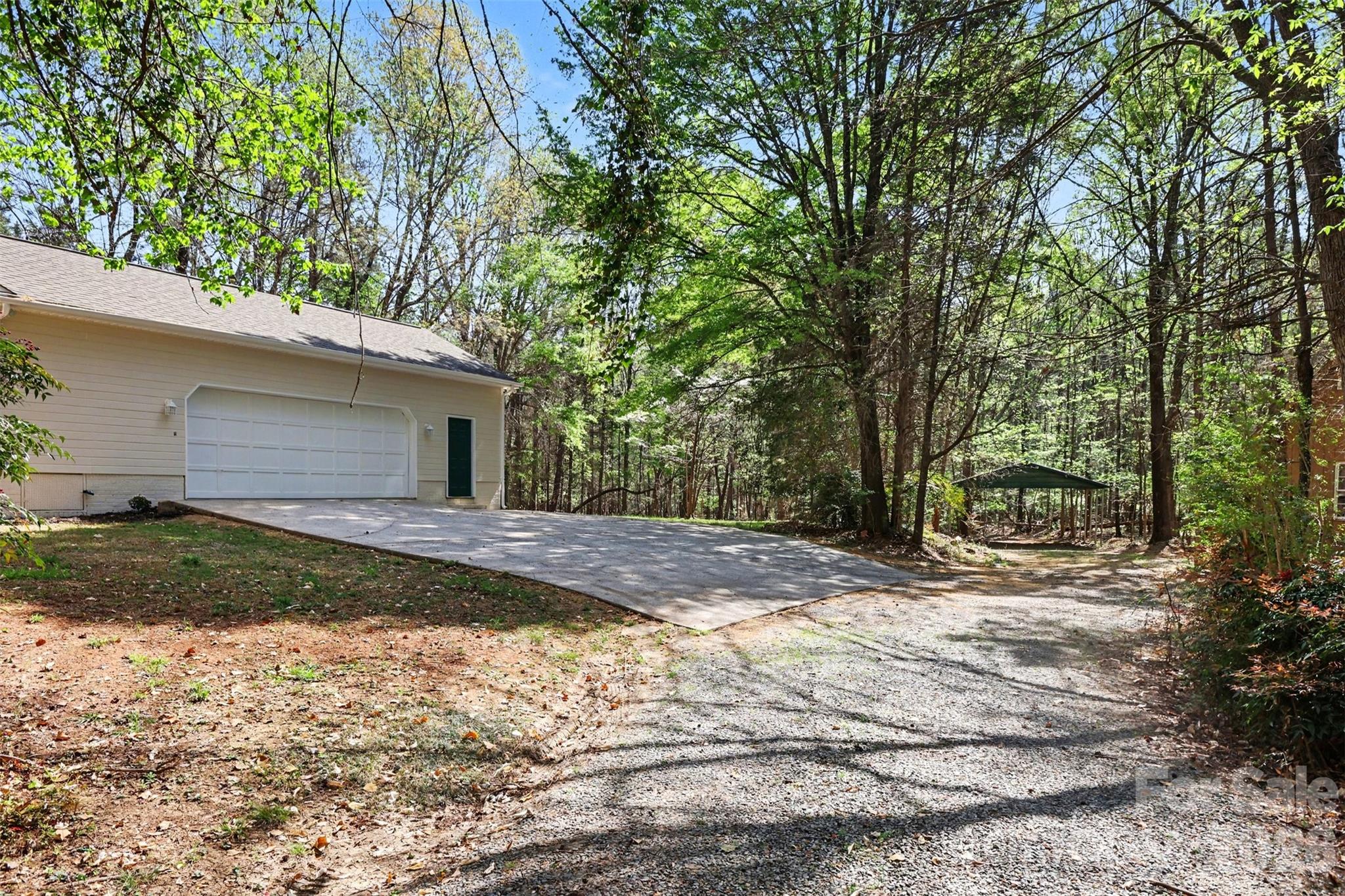 10542 Blair Road Mint Hill, NC 28227 - Photo 24 of 31 a front view of a house with a yard and garage