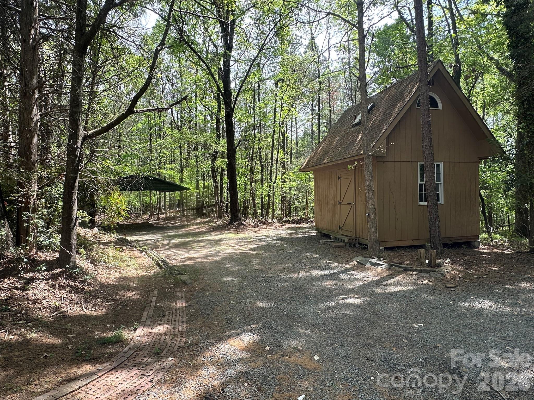 10542 Blair Road Mint Hill, NC 28227 - Photo 29 of 31 a view of a house with a yard