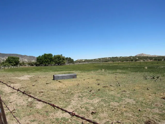a view of lake with green space