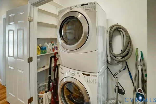 a close view of a utility room with dryer and washer