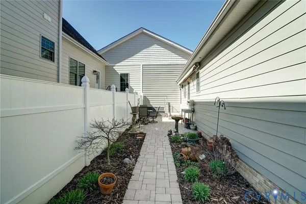 a view of a pathway with a house