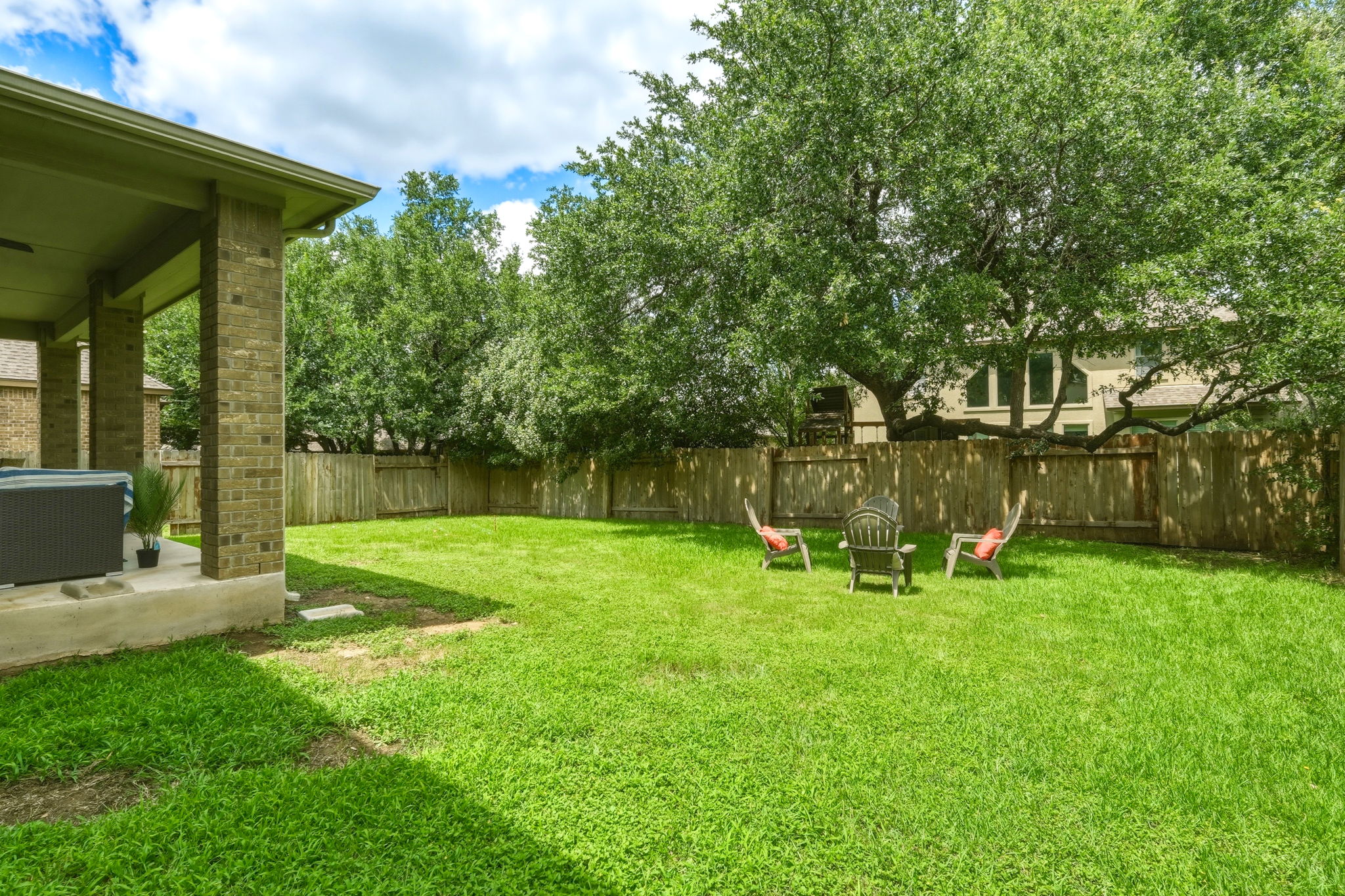 110 Dasher Drive Cedar Park, TX 78613 - Photo 18 of 39 A spacious, verdant yard with mature trees offers a private oasis for outdoor enjoyment.